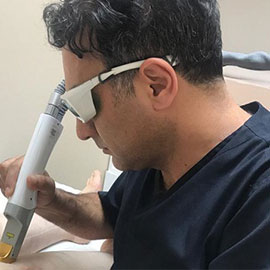 دکتر اکبر ایلاتی متخصص پوس مو در ارومیه